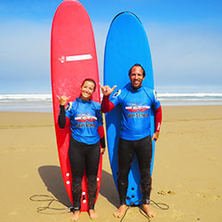 two beginners surfers photo