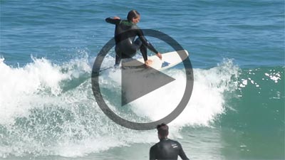 surfer peforming a fronside floater