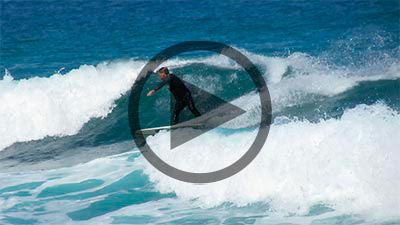 surfer performing a roundhouse cut-back